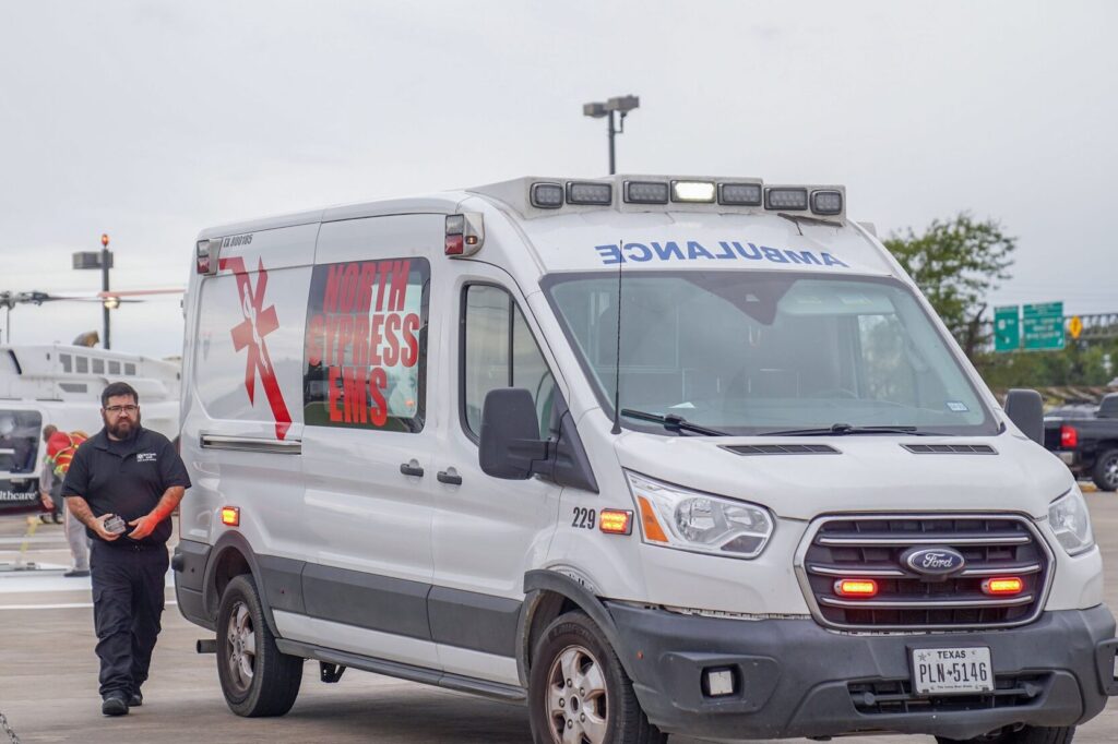 Front of Ambulance with Helicopter in the backgroung